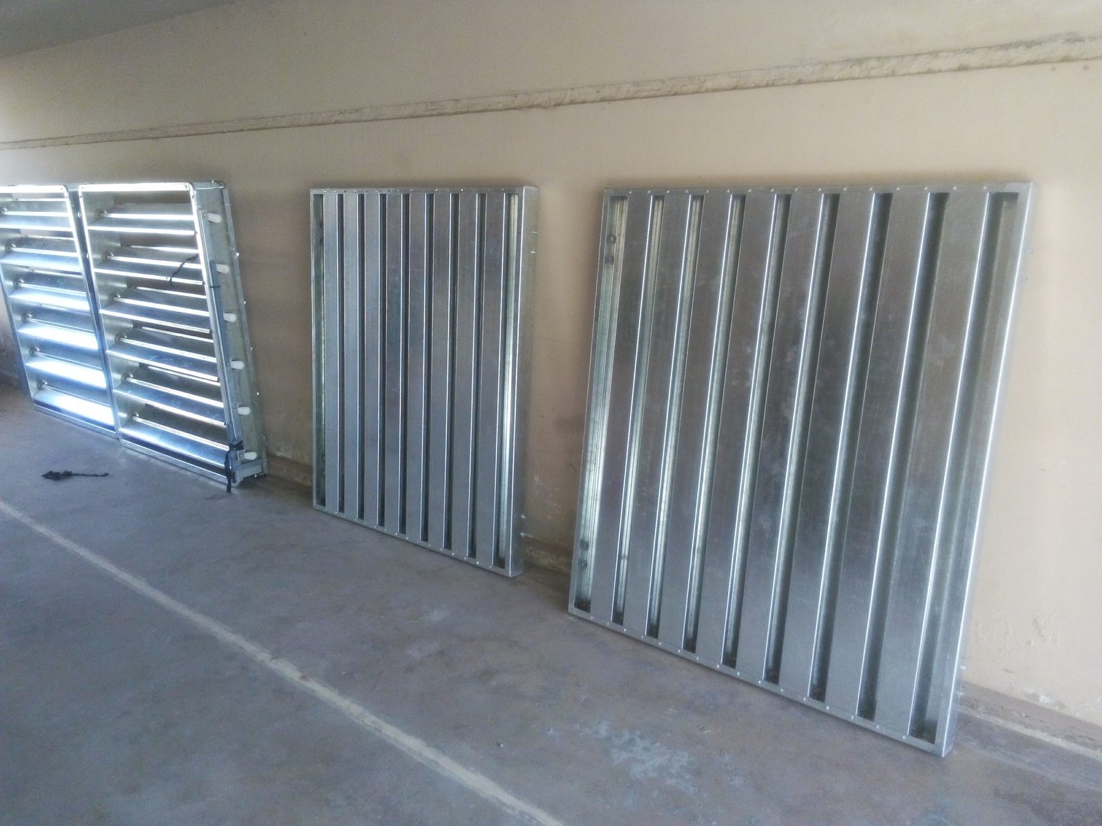 Dampers and louvers fabricated in steel