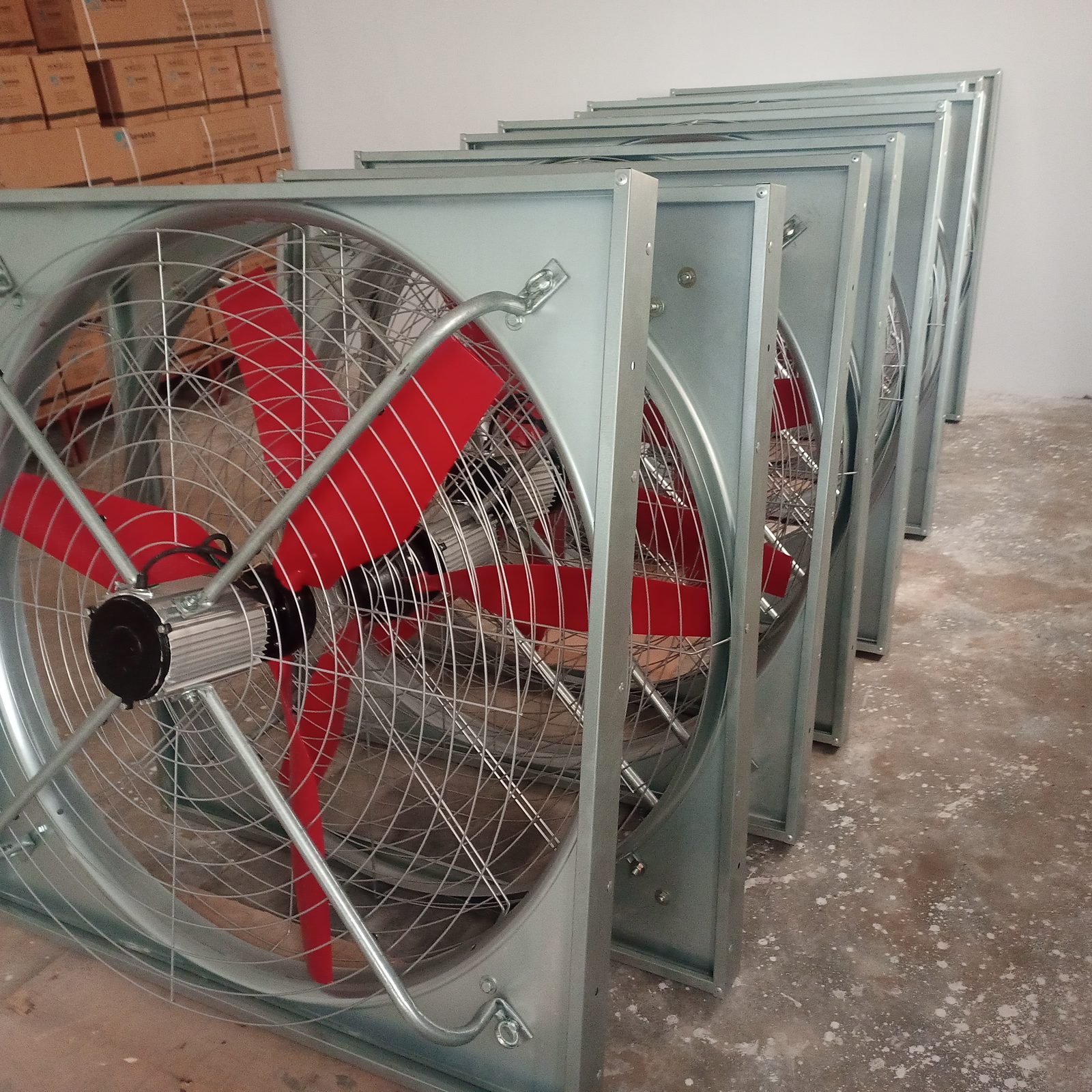 Industrial axial exhaust fan with red blades