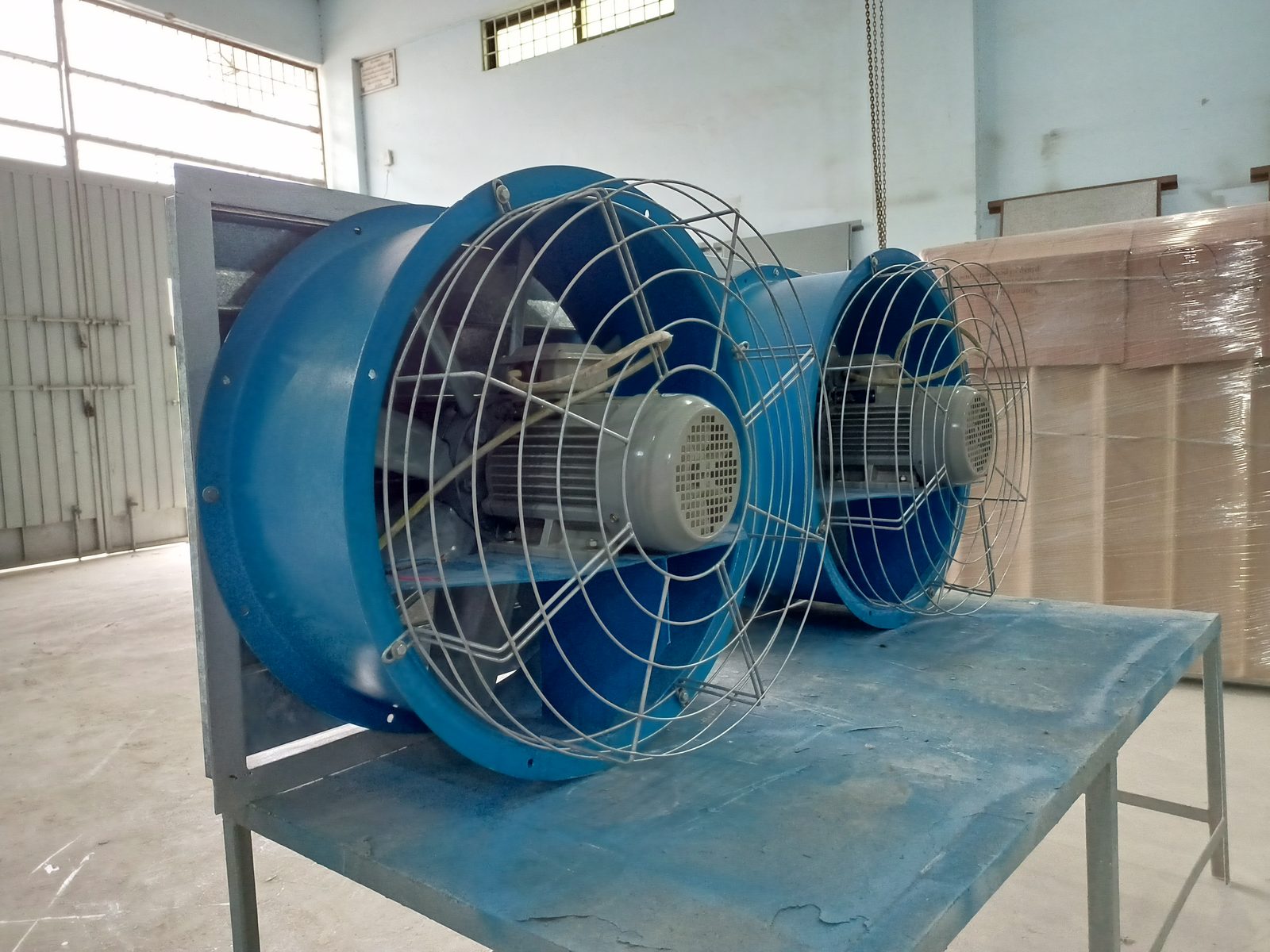Tube-axial in-line blower fan pair